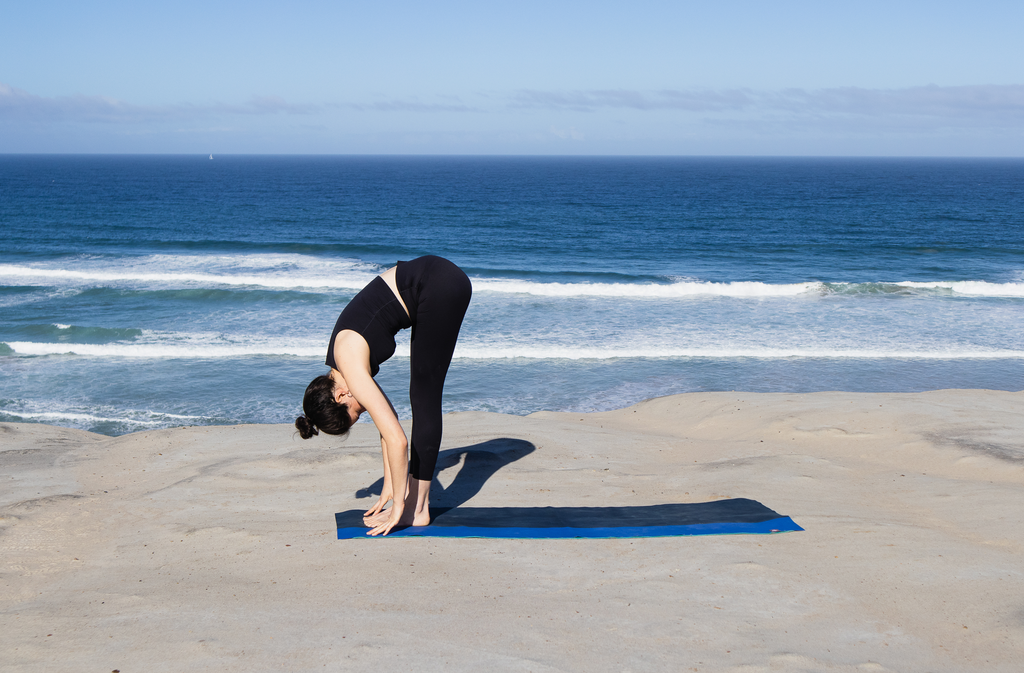 Unlock the Benefits of Uttanasana: A Guide to the Five Variations and Their Benefits